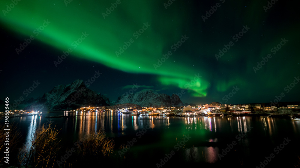 Northern lights over the vilage of Reine, Lofoten, Norway
