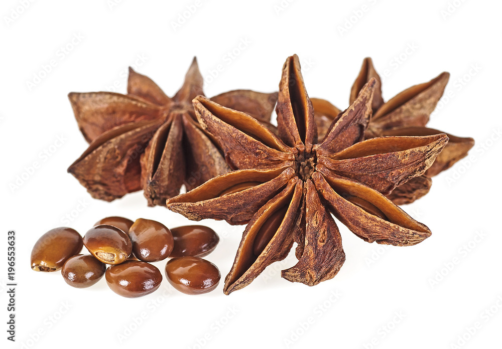 Stars of anise and seeds isolated on white background. Badian spice. Stars of anise and seeds isolated on white background. Badian spice.