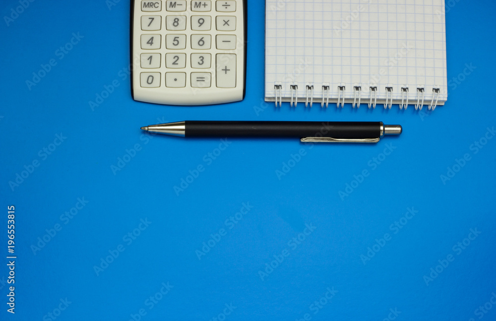 Top view office table calculator with pen on the table for business and copy space. Top view office table calculator with pen on the table for business and copy space.
