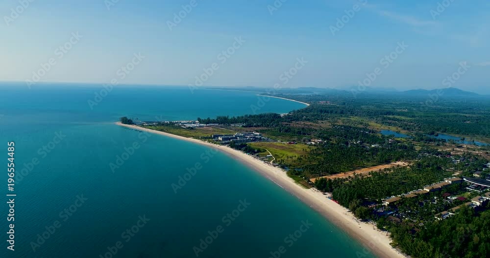 Aerial drone view of beautiful tropical island with sandy beach during sunny summer day Aerial drone view of beautiful tropical island with sandy beach during sunny summer day