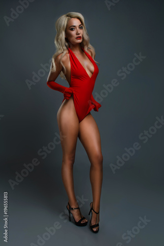 Slavic girl in a red swimsuit