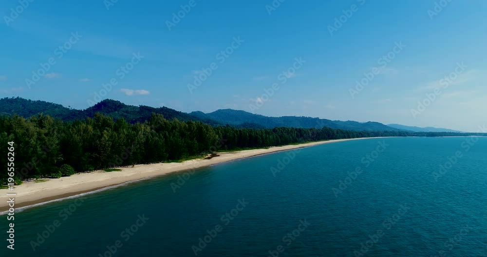 Aerial drone view of beautiful tropical island with sandy beach during sunny summer day Aerial drone view of beautiful tropical island with sandy beach during sunny summer day