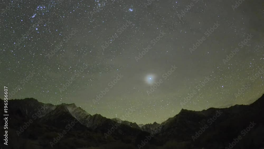 Moonrise and star time lapse above Mount Whitney in the Sierra Nevada Mountains near Lone Pine, California. Moonrise and star time lapse above Mount Whitney in the Sierra Nevada Mountains near Lone Pine, California.