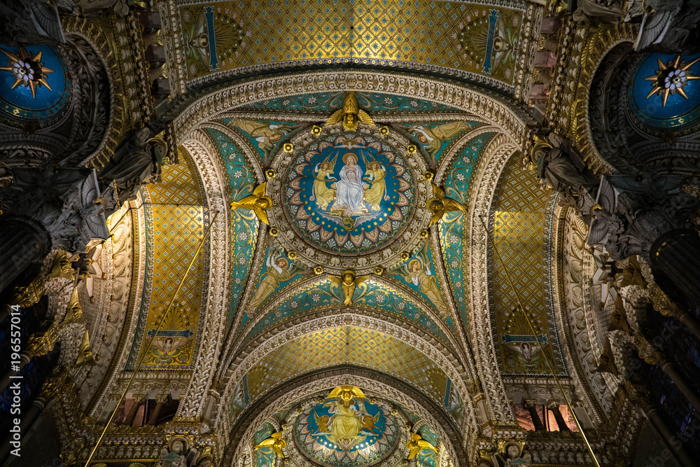 Ceiling of basilica Notre-Dame de Fourrière in Lyon, France, golden ornaments