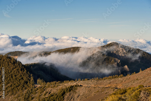 Sea of clouds in volcanic landscape of Teide national park, Tenerife, Canary islands, Spain.