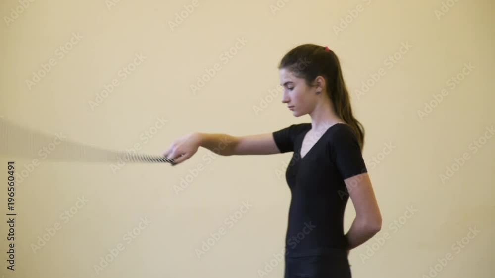 sport fitness. athletic lifestyle. gymnastics calisthenics rope exercise training. artistic performance of young fit teen girl in a studio sport fitness. athletic lifestyle. gymnastics calisthenics rope exercise training. artistic performance of young fit teen girl in a studio