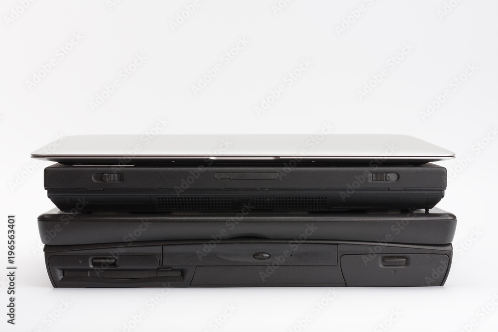 Comparing of laptops, new modern and old laptop, present and past Comparing of laptops, new modern and old laptop, present and past