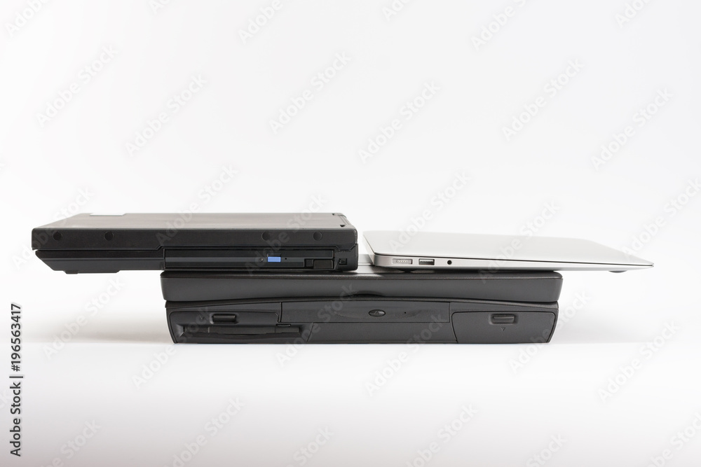 Comparing of laptops, new modern and old laptops, present and past Comparing of laptops, new modern and old laptops, present and past