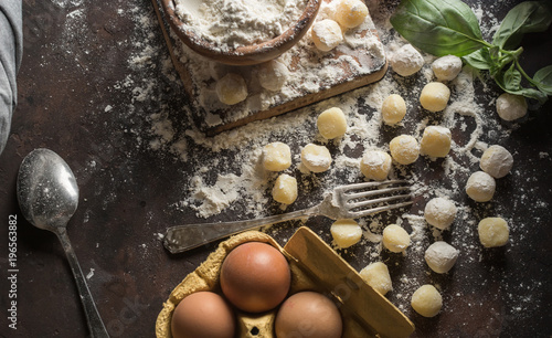 Raw gnocchi, typical Italian made of potato, flour and egg dish. photo