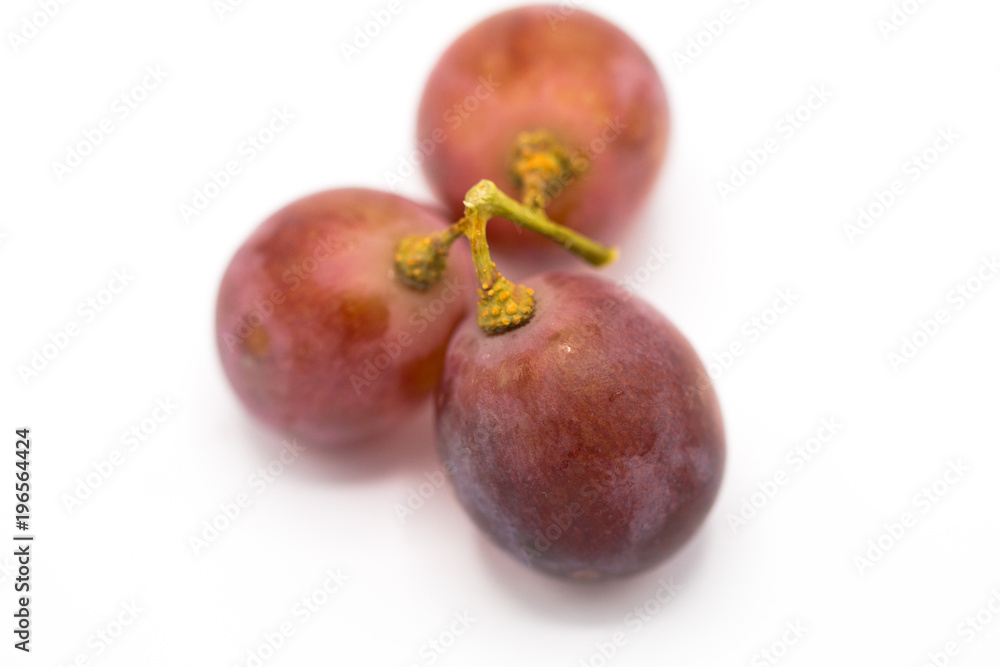 Fototapeta premium red grape raw isolated on white background, front view from the top, technical cost-up.