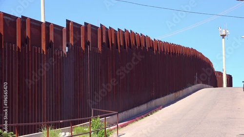 A view along the US Mexico border at Nogales, Arizona. photo