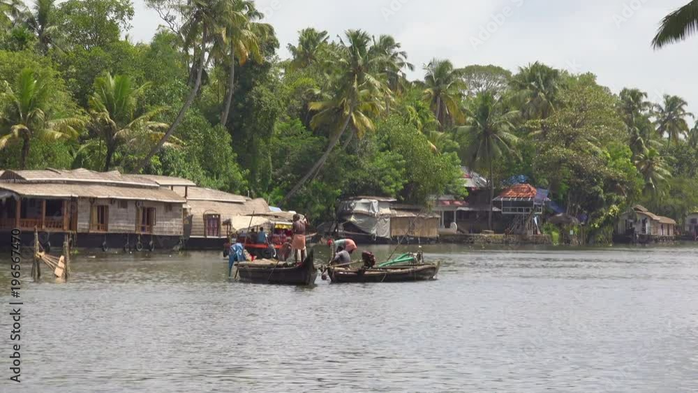 Activities along the river in the backwaters of Kerala, India. Activities along the river in the backwaters of Kerala, India.