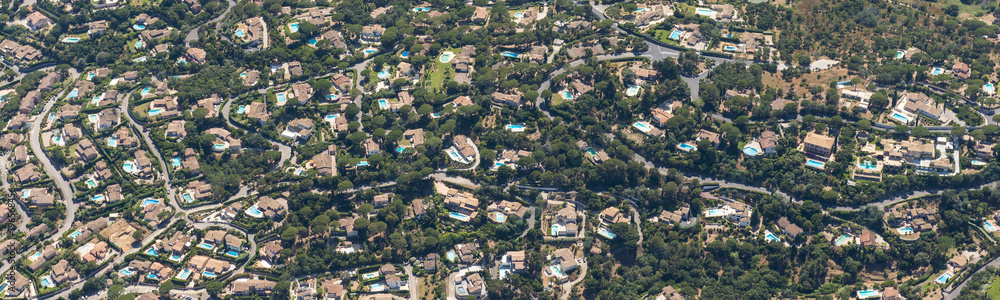 Aerial image of an abundancy of private swimming pools at these villas in Sainte-Maxime