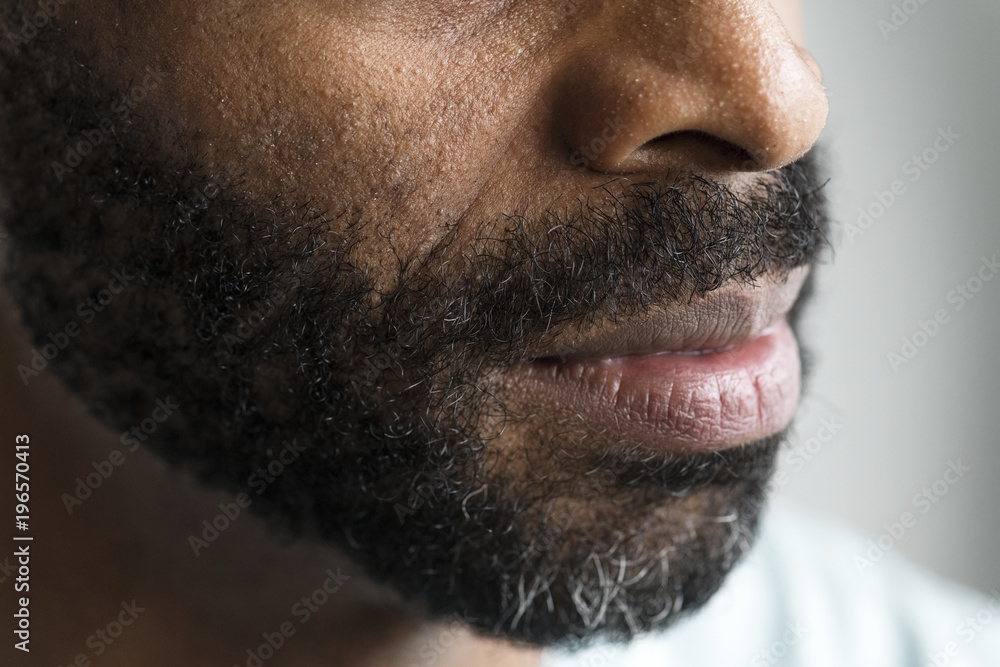 Fototapeta premium Closeup of a mouth of a black man