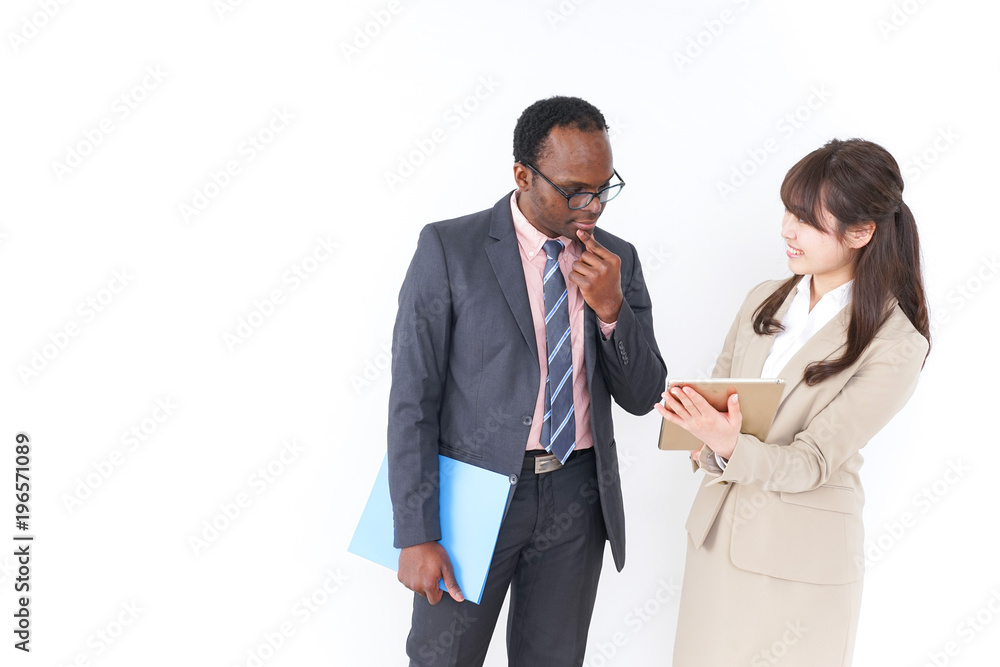 Businesspersons using a tablet Businesspersons using a tablet