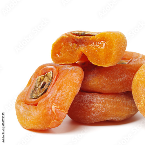 dried persimmon on white background  photo