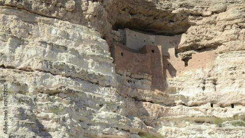 Time lapse of shadwos creeping across the ancient American Indian ruins of Montezuma Castle National Monument in Arizona. photo