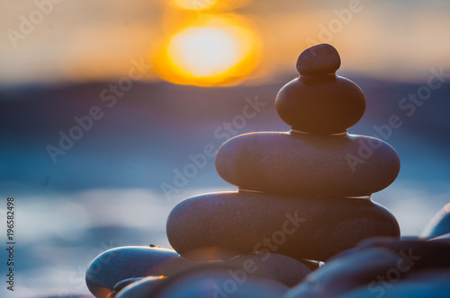 Photography stack of zen stones on pebble beach