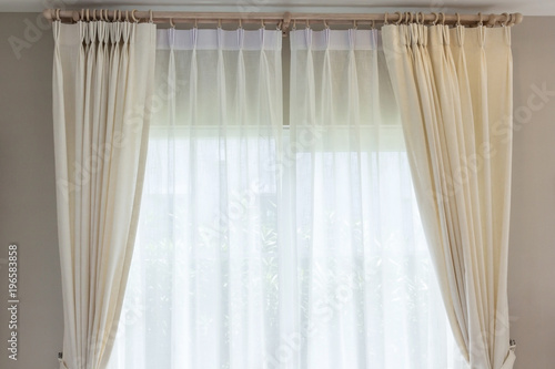 White curtain inside the window. Home interior decoration