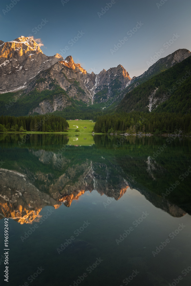 Fototapeta premium Mountain lake in Italy during sunset. 