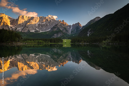 Mountain lake in Italy during sunset.  © PawelUchorczak