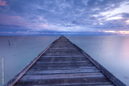 seascape with wooden jetty