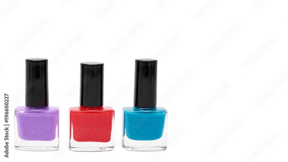 colored nail polish bottles isolated on white background. copy space, template colored nail polish bottles isolated on white background. copy space, template