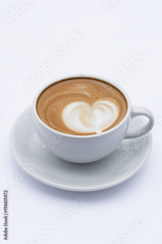 Coffee latte in a white mug on a white background.