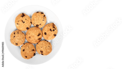 Pile of chocolate chip cookies on a dish isolated on white background. copy space, template