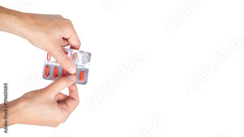 Capsules pills in hand isolated on white background. copy space, template