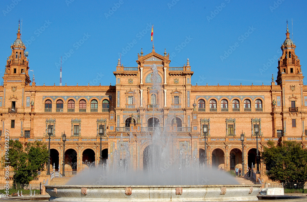 The central building of the 1929 Iberoamerican Exposition behind the fountain of the Spanish Square (Plaza de Espana) - Seville, Andalucia, Spain