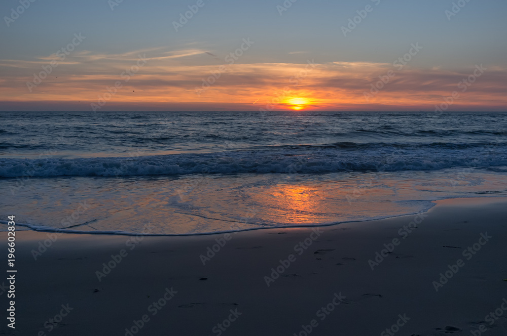 Beautiful and colorful sunset sky over the North Sea, Petten, Holland