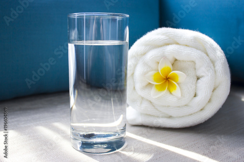 A glass beaker with clear water. The concept of SPA. Copy space 1 photo