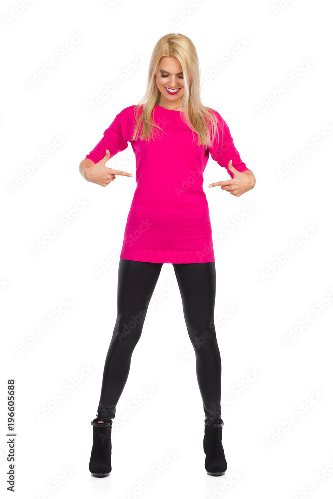 Fototapeta premium Beautiful Slim Woman Is Pointing At Her Waist