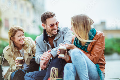 Group of smiling friends having fun outdoor © Mediteraneo