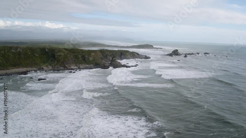 Wallpaper Mural Drone shot of waves crashing into the west coast of New Zealand. Torontodigital.ca