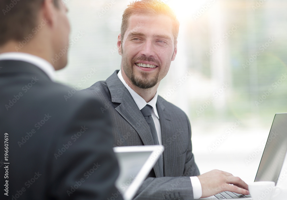 closeup.business partners discussing business issues closeup.business partners discussing business issues
