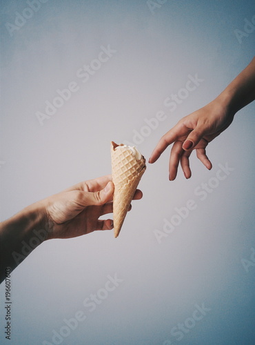 Creation of icecream. Concept of reproduction for creation of Adam with icecream photo