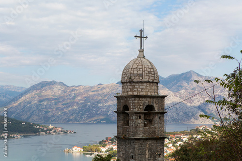 cross the old stone Church in the town of Kotor photo