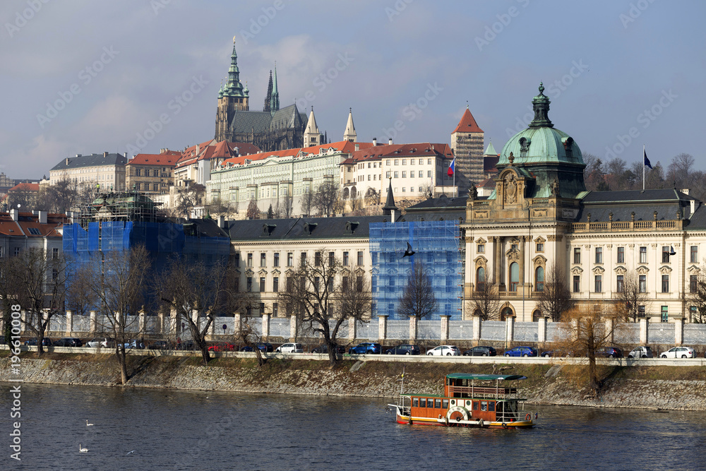 Fototapeta premium Early Spring Prague gothic Castle with the Lesser Town above River Vltava in the sunny Day, Czech Republic