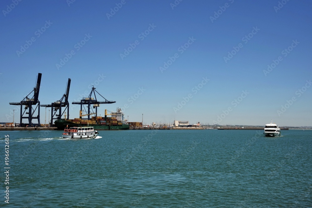 In the harbor of the seaport of Cadiz on the shore of the Cadiz Gulf of the Atlantic Ocean.