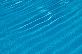 water texture in a pool with waves and reflection