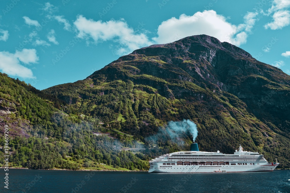A big cruiser in the Norway fjord Geiranger.