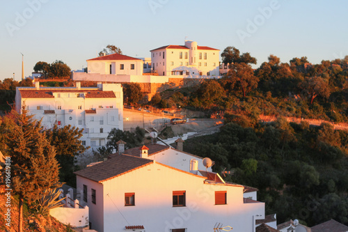 White houses old town mountain sunset photo