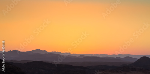 mountain silhouette in the Negev desert in Israel at sunset sunrise