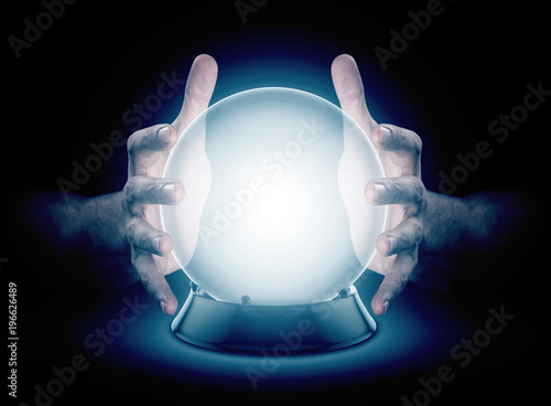 Hands On Crystal Ball And Cryptocurrency photo
