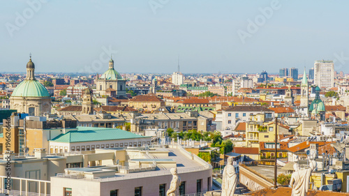 Milan city landscape from Duomo cathedral roof.