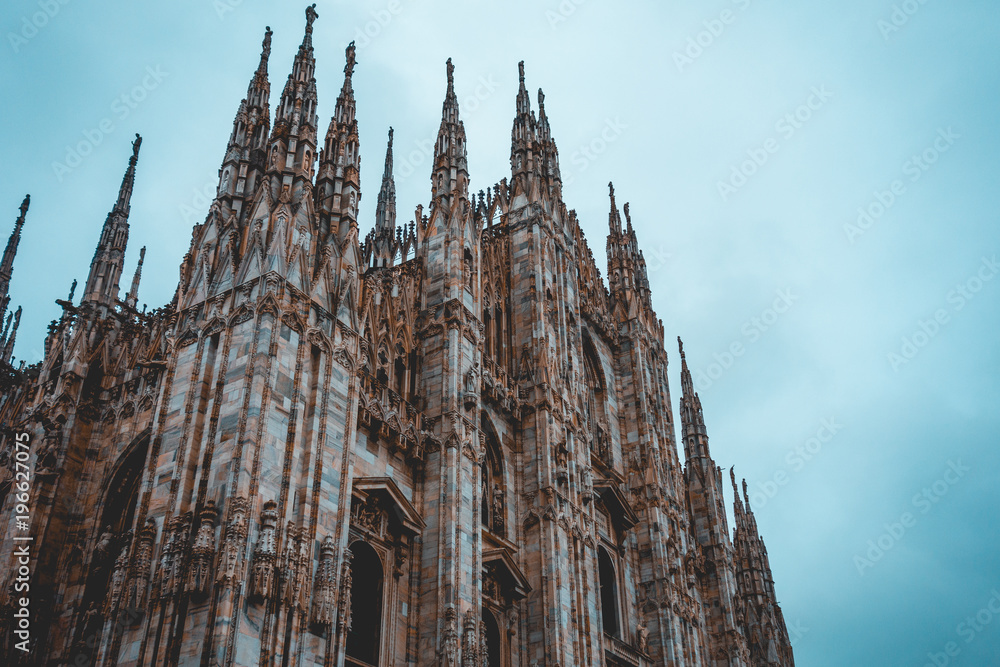 Milan Cathedral on blue darken background