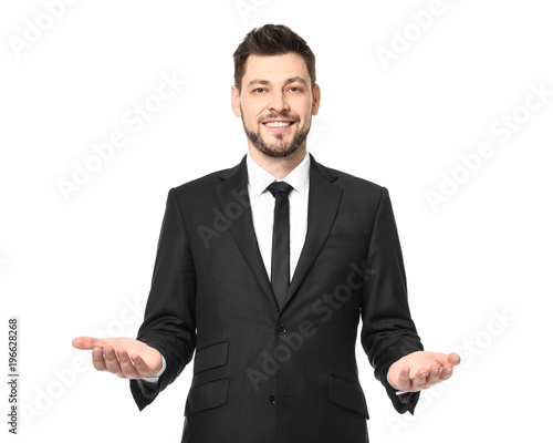 Young businessman showing b...