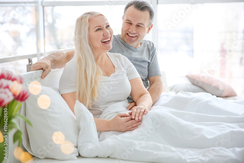 Senior couple in bed togeth...